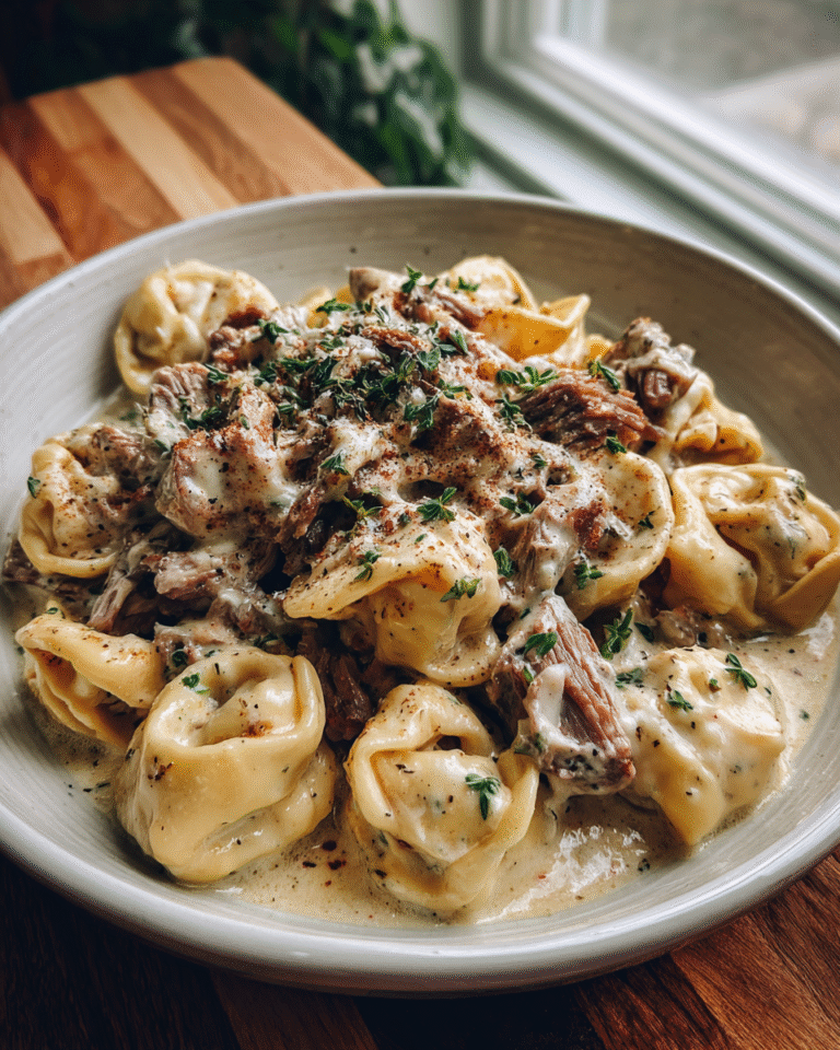 Indulge in the Ultimate Comfort: Creamy Cheesesteak Tortellini in Provolone Sauce - Featured Image