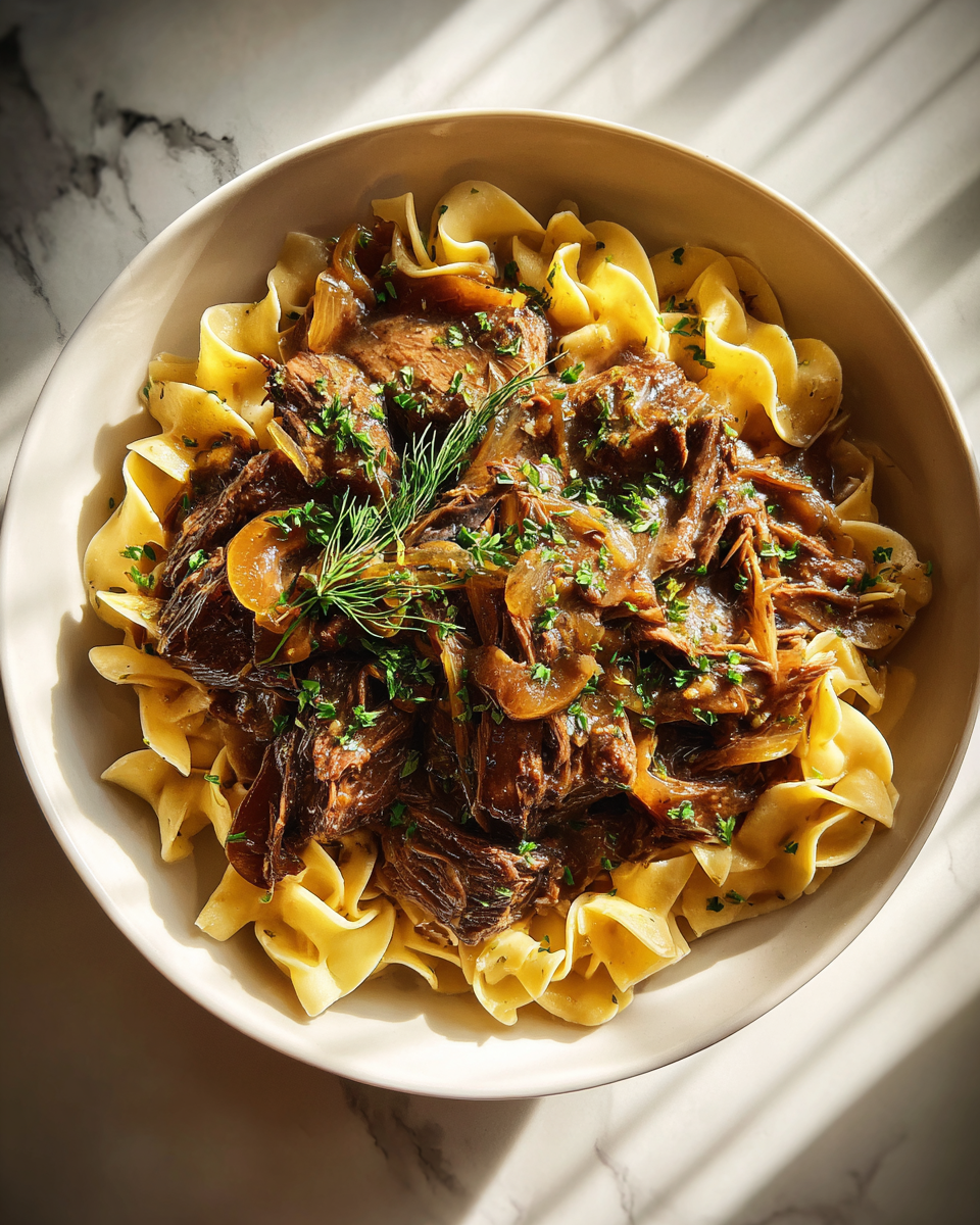 Final dish - Savor the Comfort: French Onion Beef and Noodles Delight