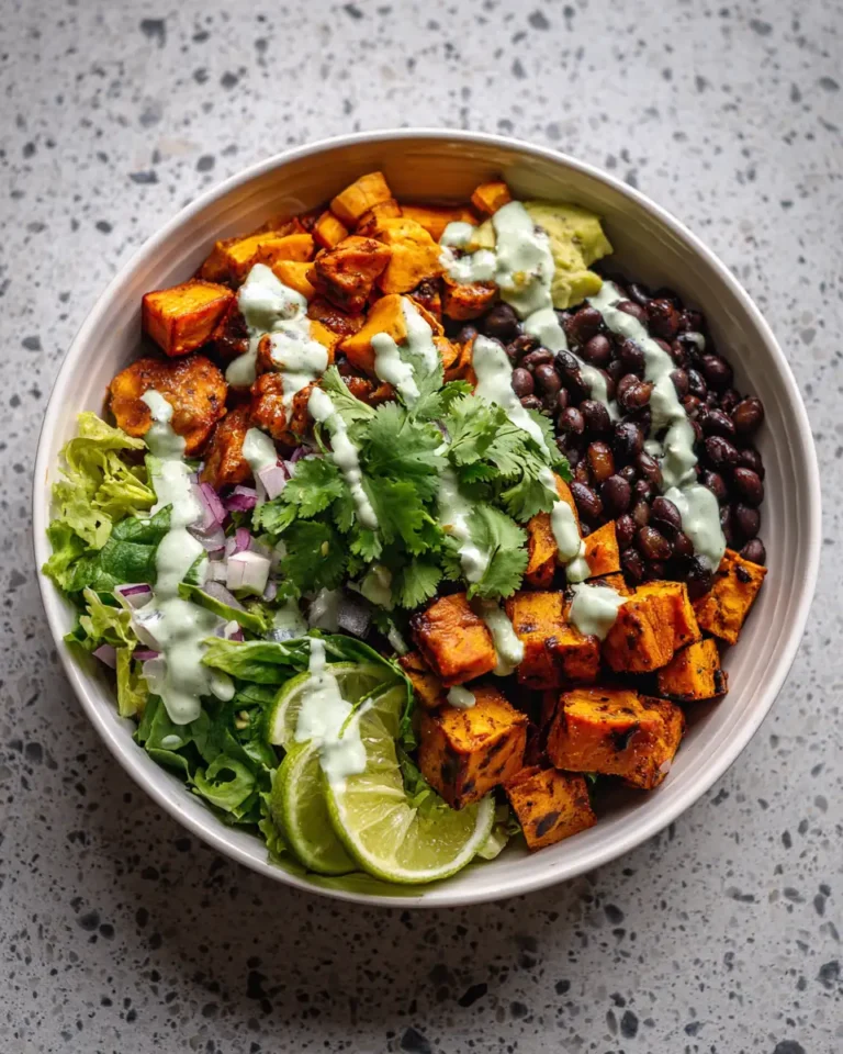 Savor the Flavor Sweet Potato and Black Bean Bowl with Cilantro Lime Yogurt Sauce - Featured Image