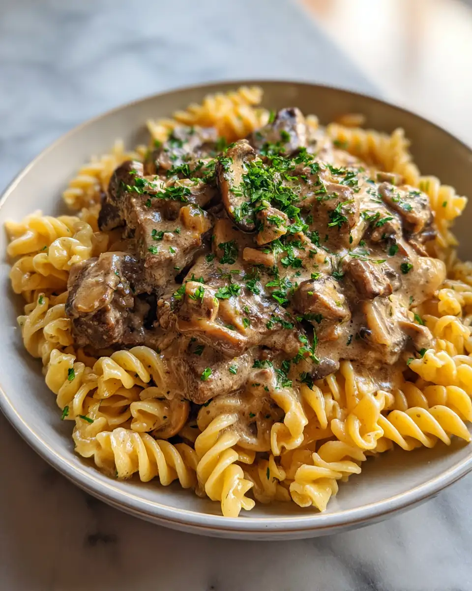 Final dish - Indulge in the Ultimate Comfort: Creamy Beef Stroganoff Pasta Perfection