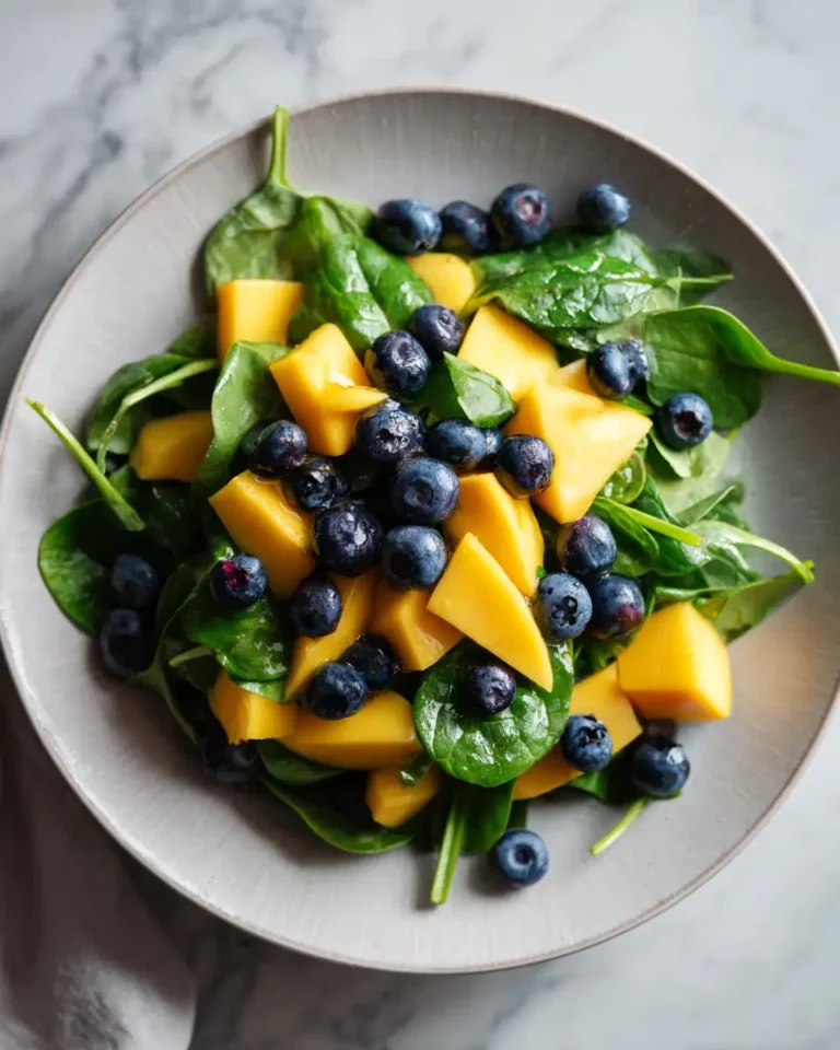 Tantalize Your Taste Buds with a Vibrant Mango Blueberry Spinach Salad - Featured Image